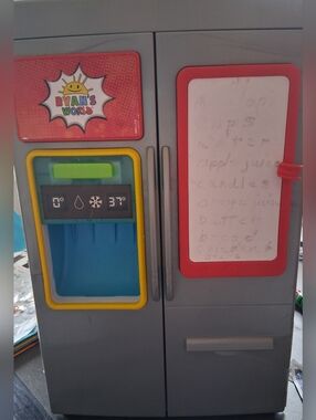 Gray Toy Refrigerator with Red & Yellow Accents